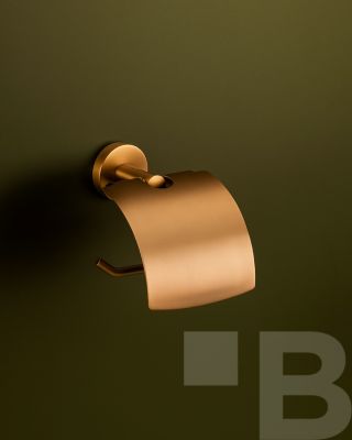 ✨ Síla jantaru v detailu. Držák toaletního papíru z kolekce Amber přináší do koupelny rafinovanost i harmonii. Broušený...